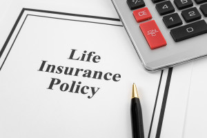 Document of Life Insurance Policy and calculator for background